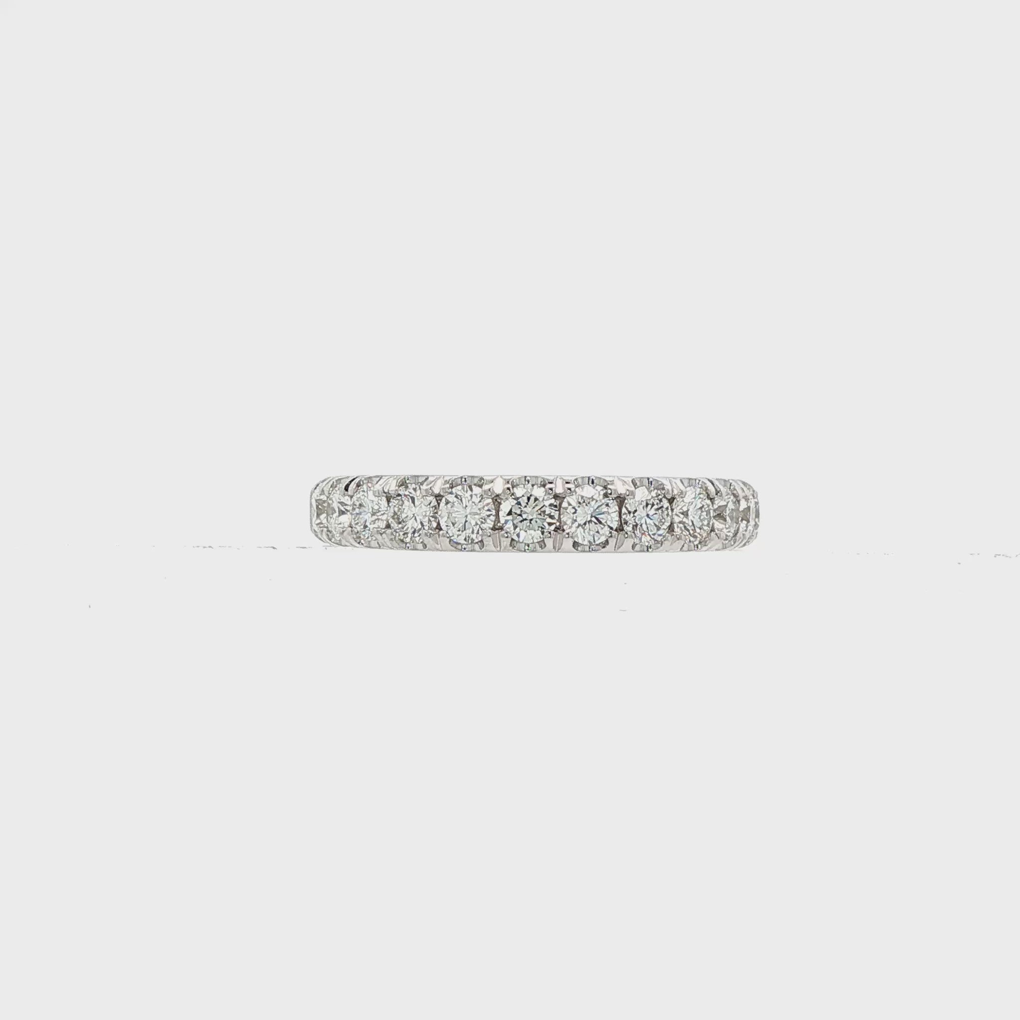 14K White gold band set with round brilliant diamonds. Item J39099 - ABC Jewelry Co.