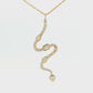 18K Yellow gold snake pendant set with natural mined diamonds of varying shapes. Item J38684 - ABC Jewelry Co. 