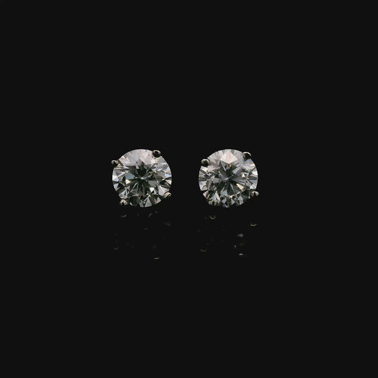 14K White gold diamond stud earrings. Item J38131 - ABC Jewelry Co. 