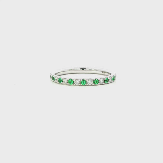 18K White gold band set with alternating diamonds and emeralds. Item J36393 - ABC Jewelry Co. 