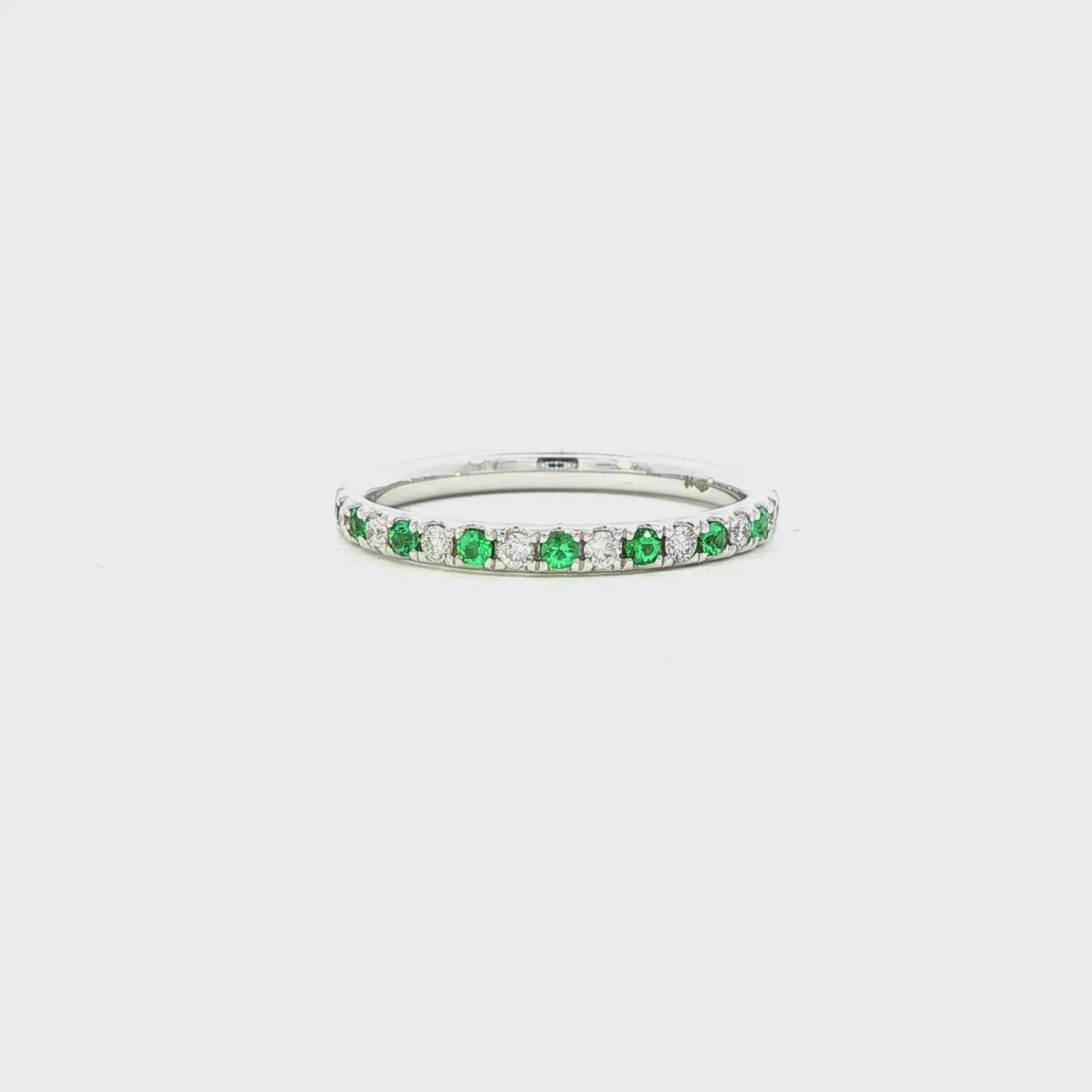 18K White gold band set with alternating diamonds and emeralds. Item J36393 - ABC Jewelry Co. 