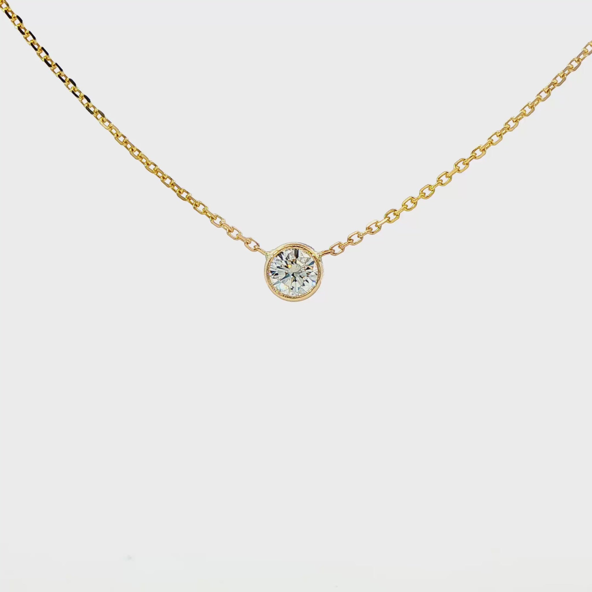14K Yellow gold bezel set solitaire necklace. Item J38378 - ABC Jewelry Co