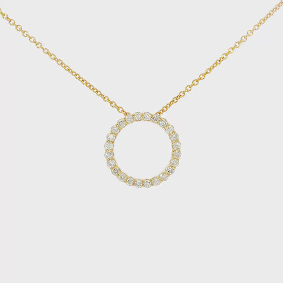 14K Yellow gold necklace with diamond set circle pendant. Item J36922 - ABC Jewelry Co
