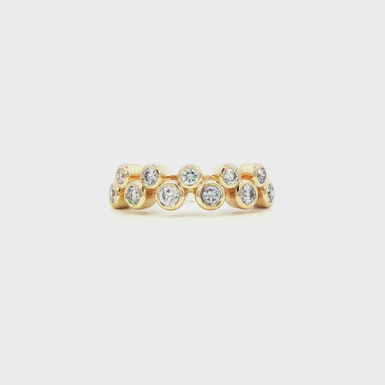 14K Yellow gold ring with 11 bezel set natural mined diamonds. Item J38730 - ABC Jewelry Co.