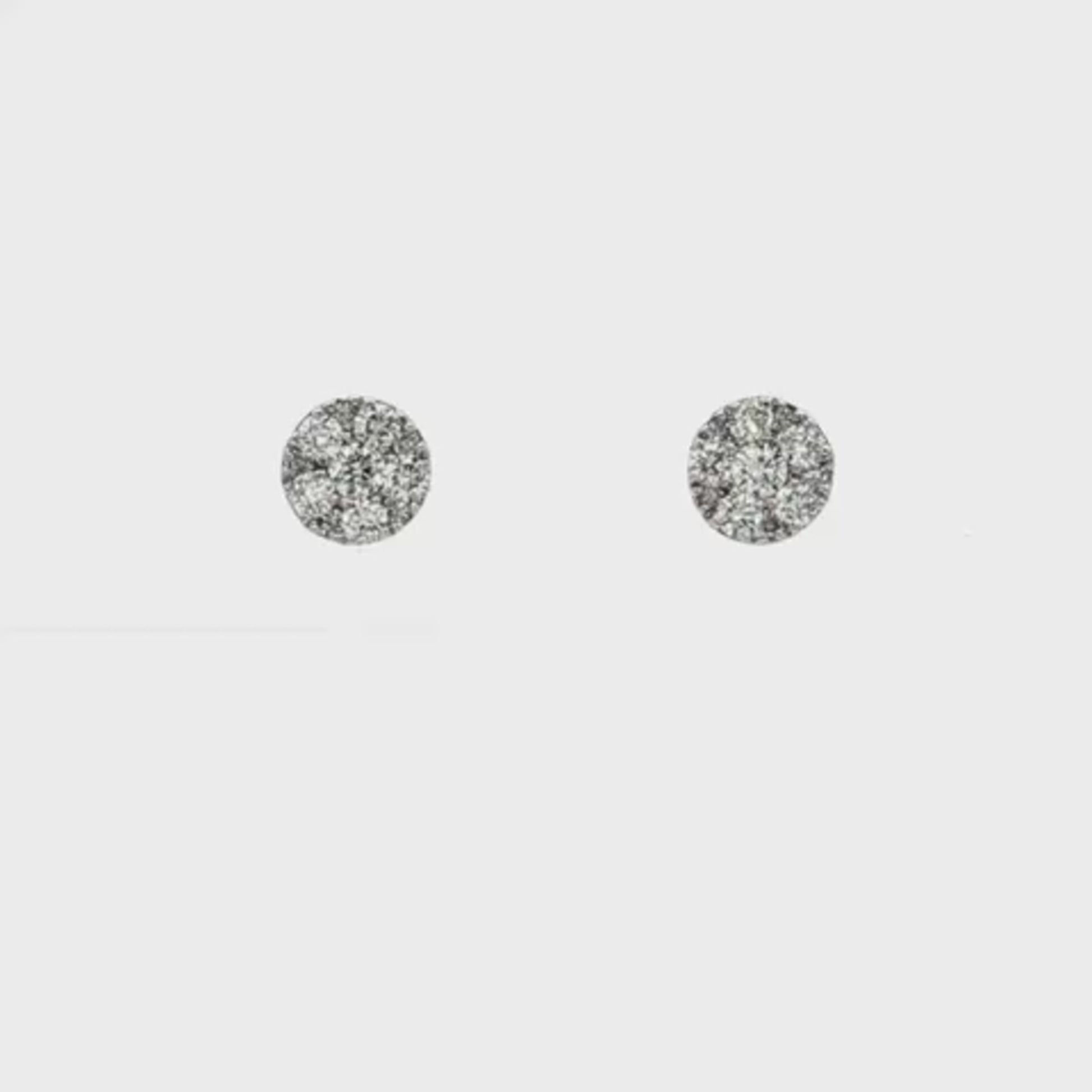 18K White gold earrings with a cluster of round brilliant diamonds. Item J37727 - ABC Jewelry Co.