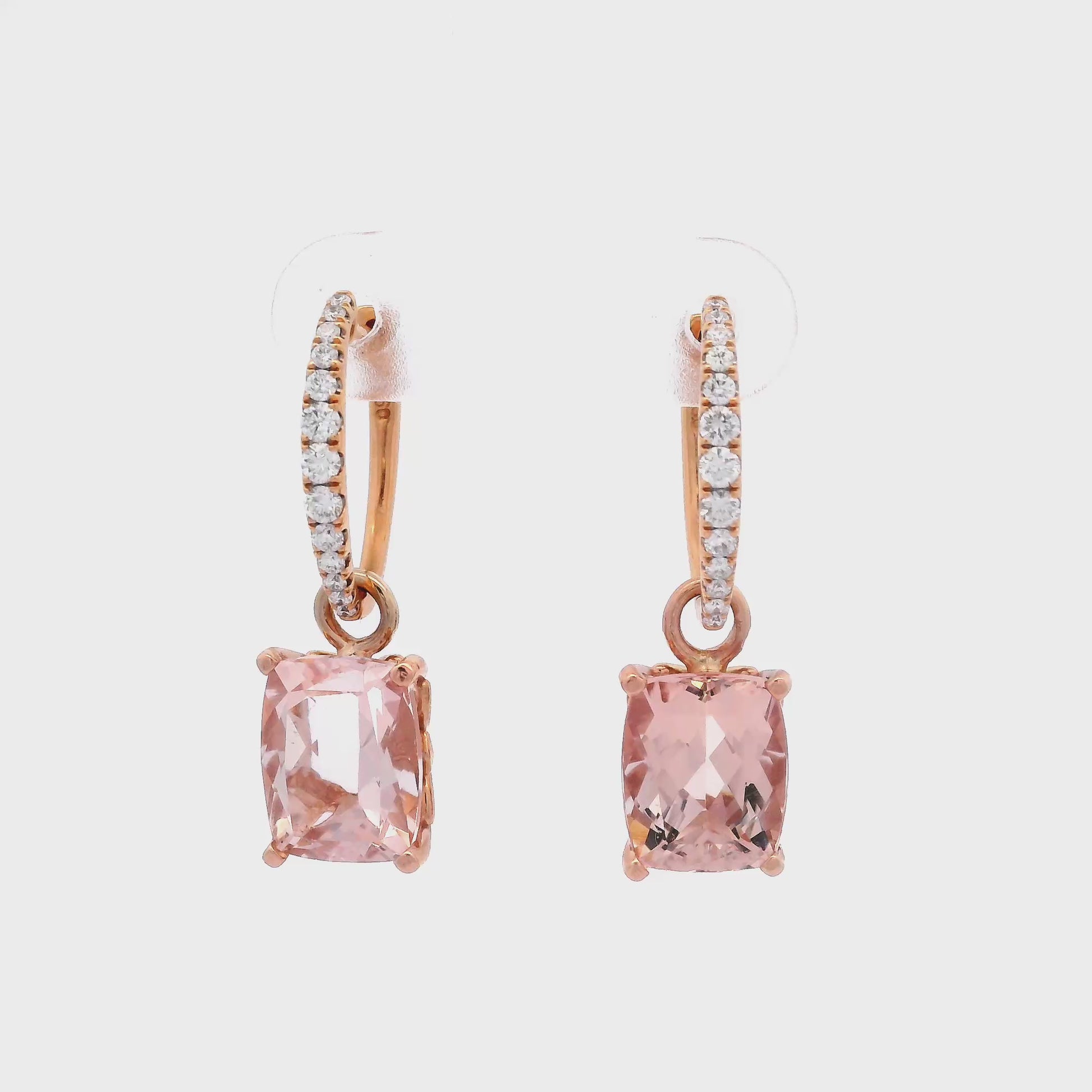 14K Rose gold earring jackets each featuring a cushion cut morganite. Item J34293 - ABC Jewelry Co. 