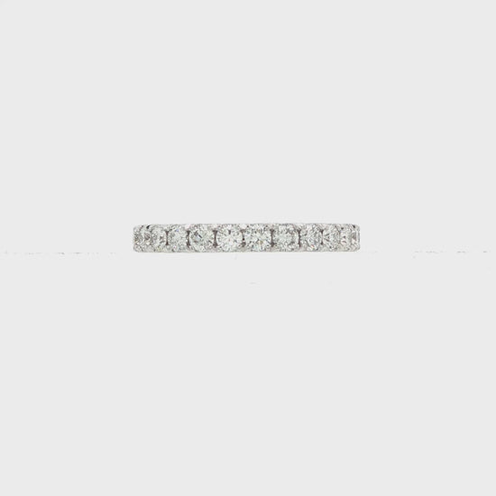 14K White gold band set with round brilliant diamonds. Item J38749 - ABC Jewelry Co.