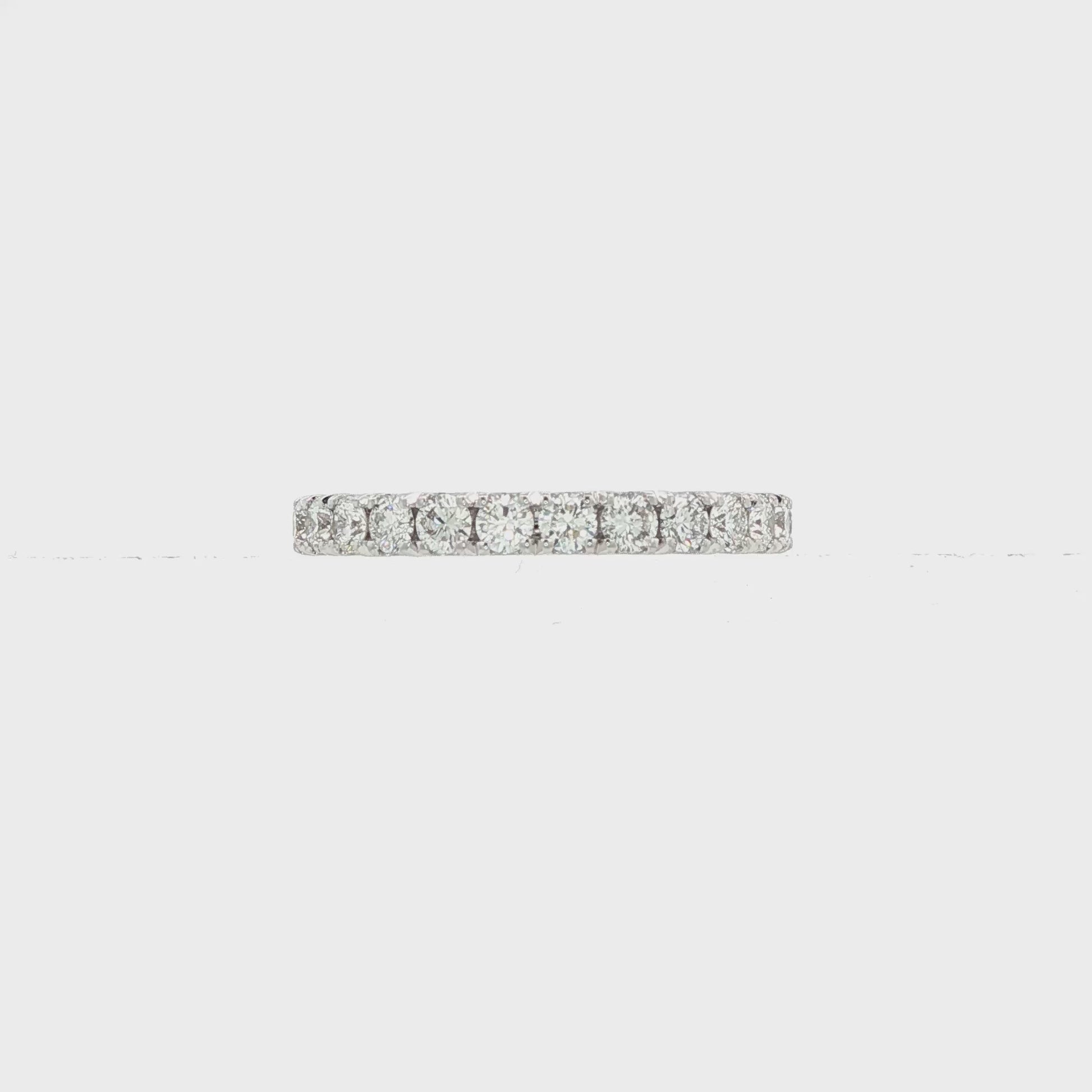 14K White gold band set with round brilliant diamonds. Item J38749 - ABC Jewelry Co.