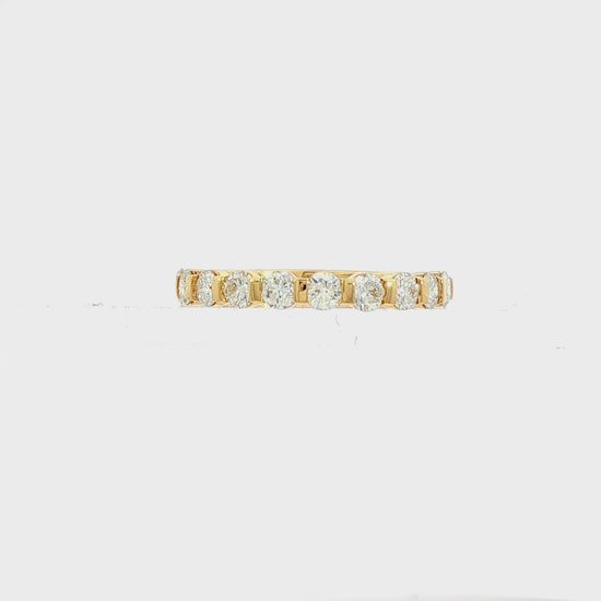 18K yellow gold band set with round brilliant diamonds. Item J38834 - ABC Jewelry Co. 