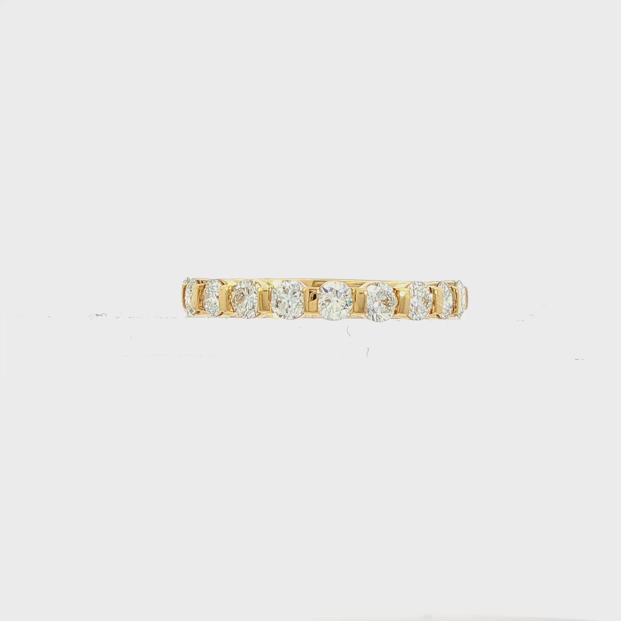 18K yellow gold band set with round brilliant diamonds. Item J38834 - ABC Jewelry Co. 