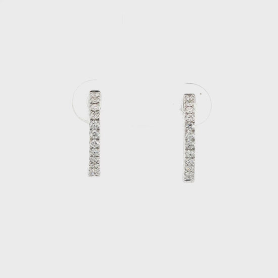 14K White gold hoop earrings set with round brilliant diamonds. Item number J38778 - ABC Jewelry Co.