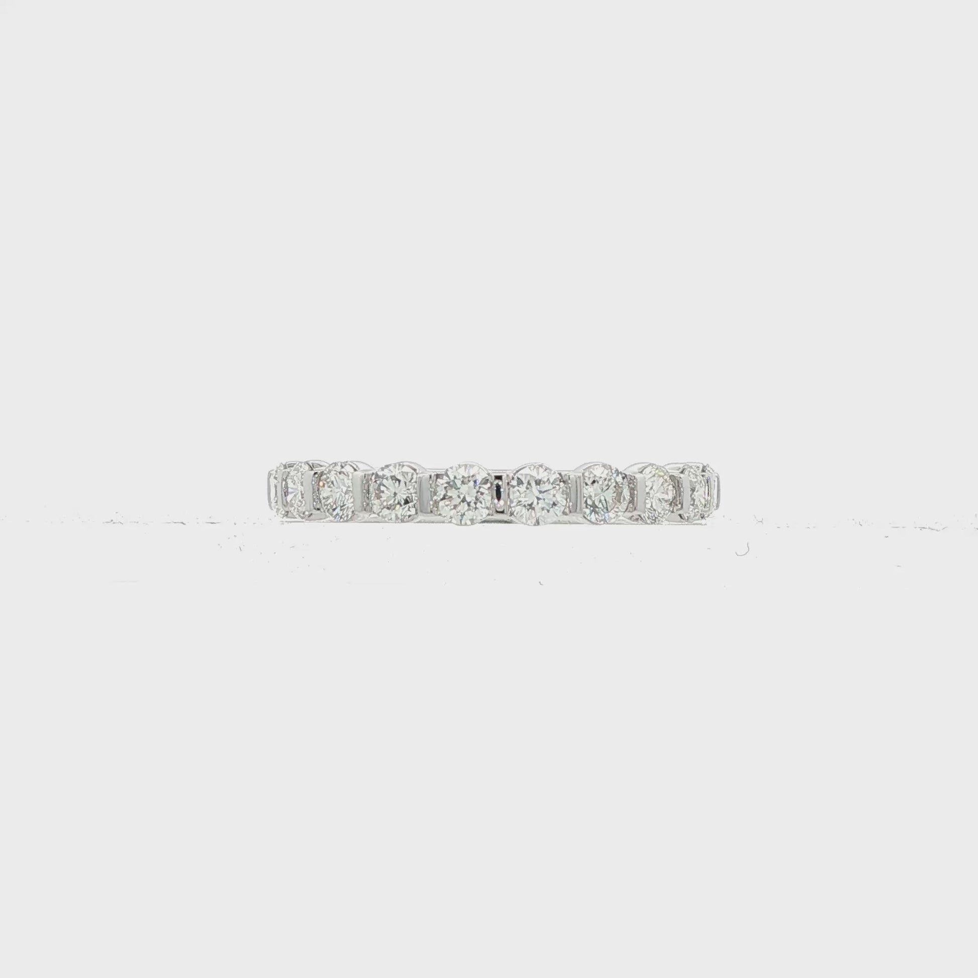 18K White gold band set with 10 round brilliant diamonds. Item J38836 - ABC Jewelry Co.
