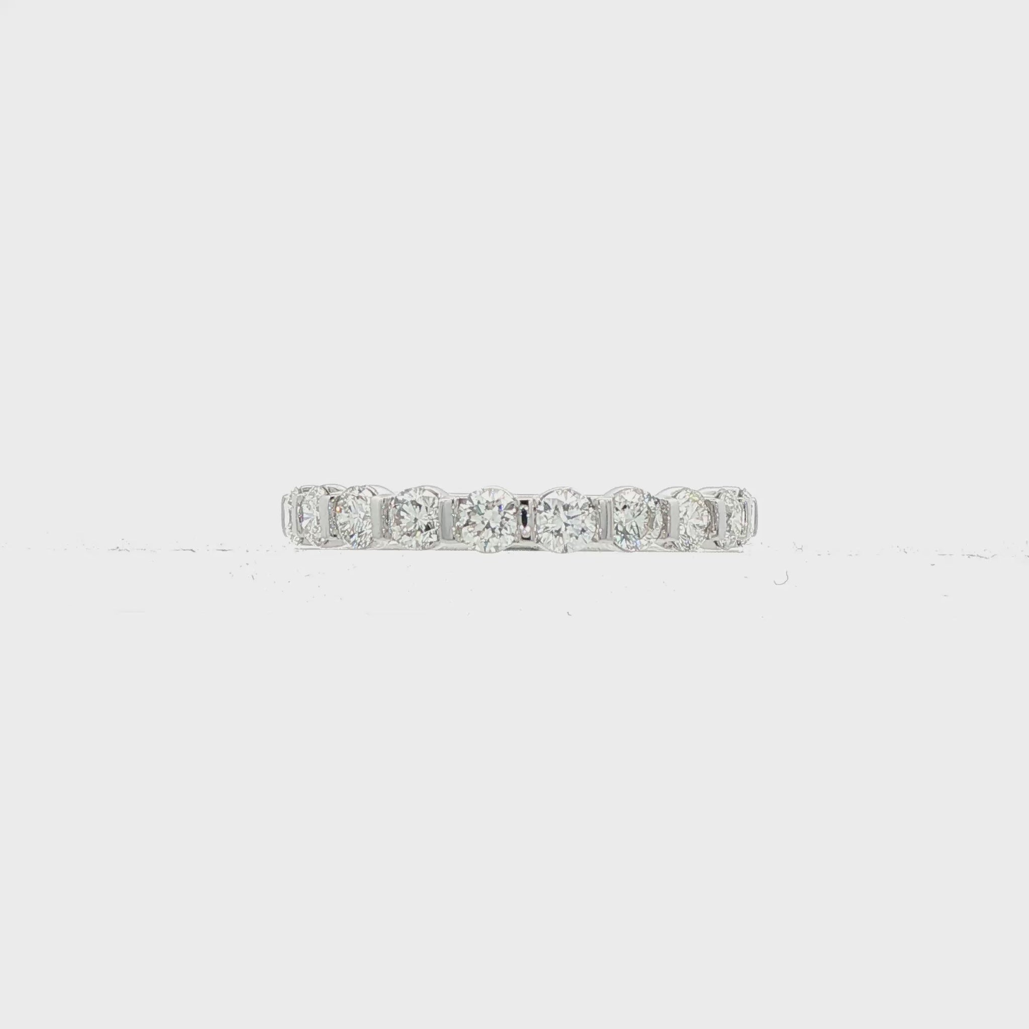 18K White gold band set with 10 round brilliant diamonds. Item J38836 - ABC Jewelry Co.