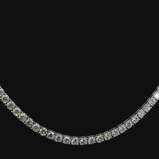 14K White gold tennis necklace set with round brilliant diamonds. Item J39087 - ABC Jewelry Co.