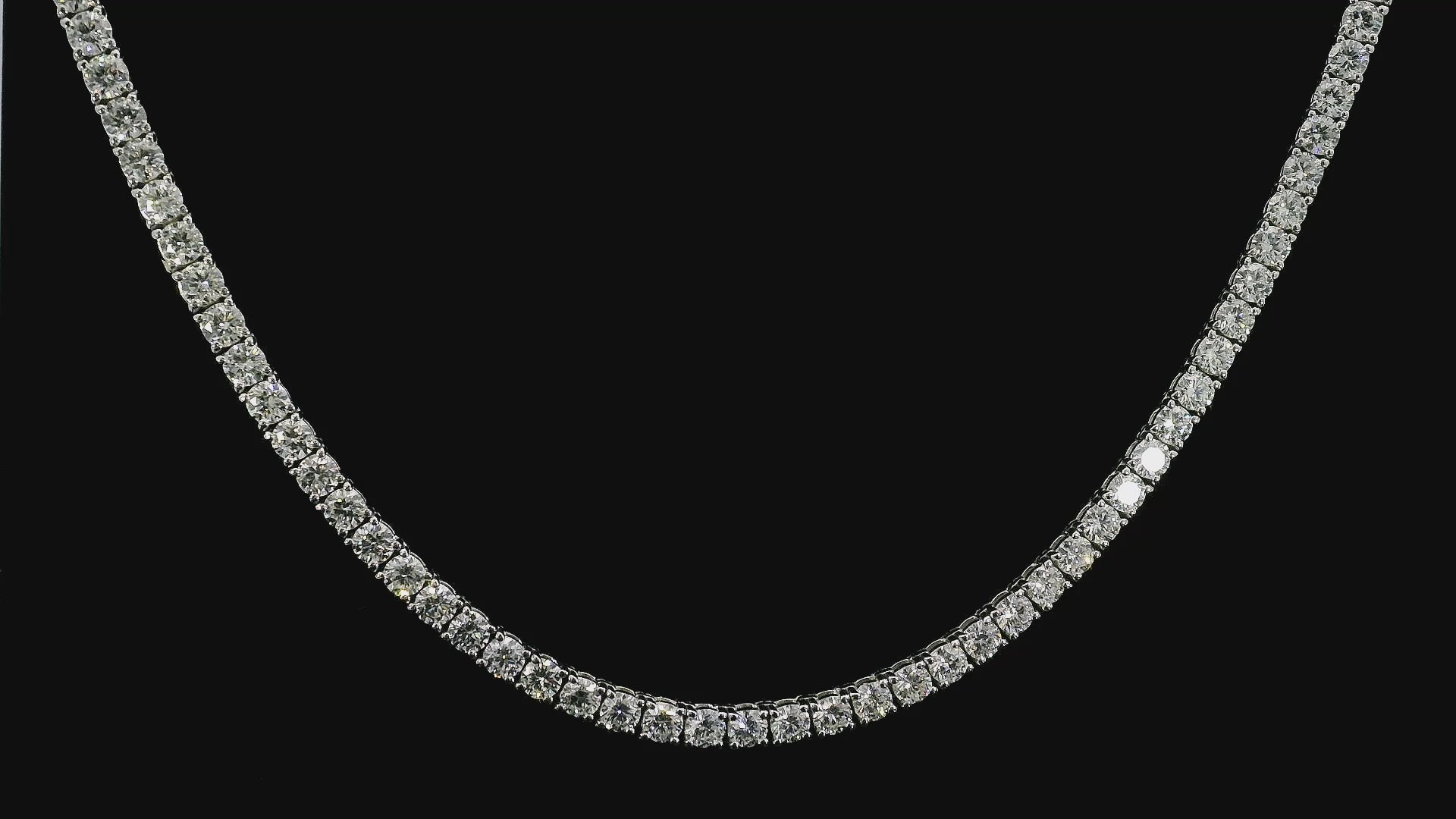14K White gold tennis necklace set with round brilliant diamonds. Item J39087 - ABC Jewelry Co.