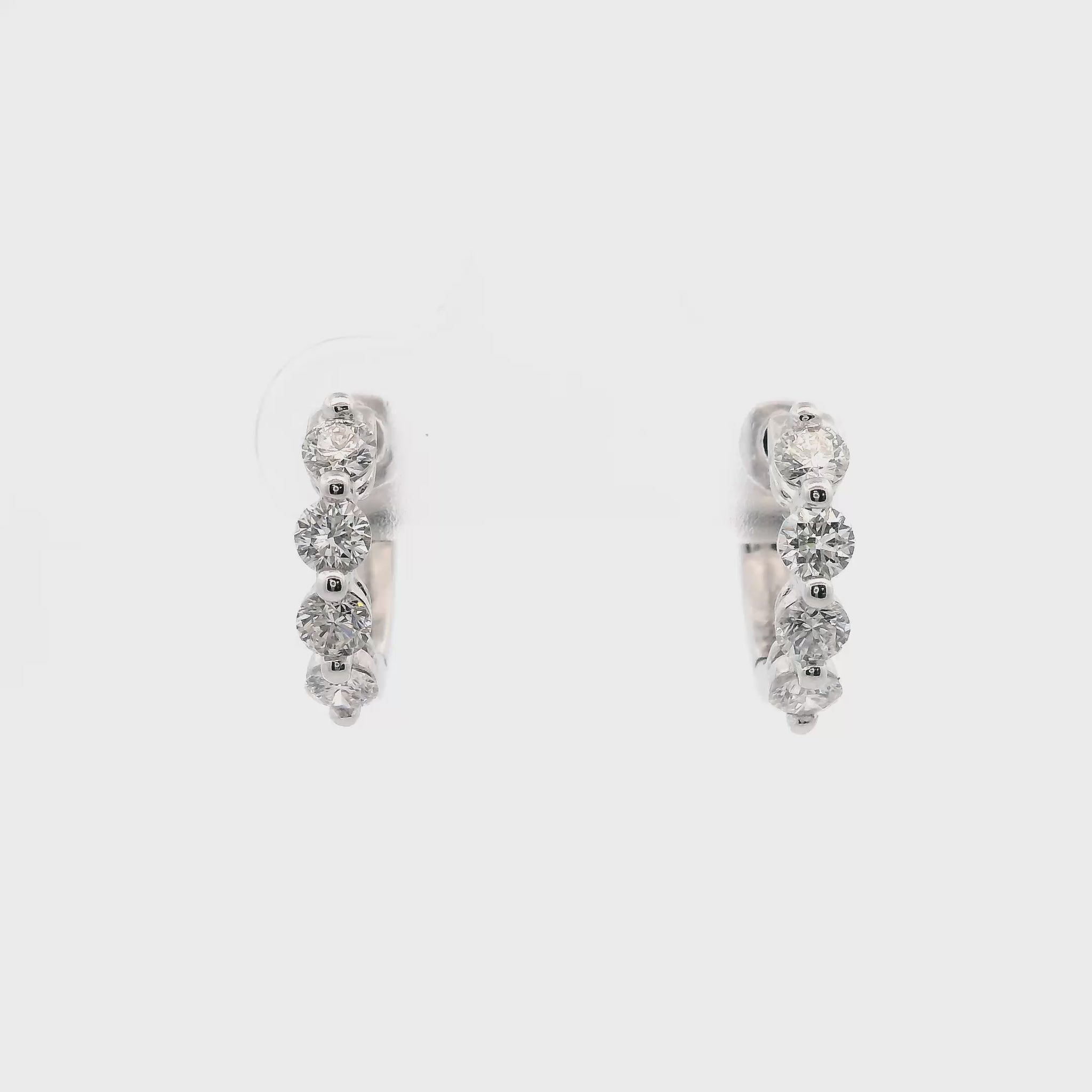 18K White gold hoop earrings set with round brilliant diamonds - item J37694, ABC Jewelry Co. 