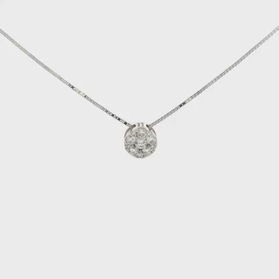 18K White gold diamond cluster pendant set with round brilliant diamonds. Item J37717 - ABC Jewelry Co. 