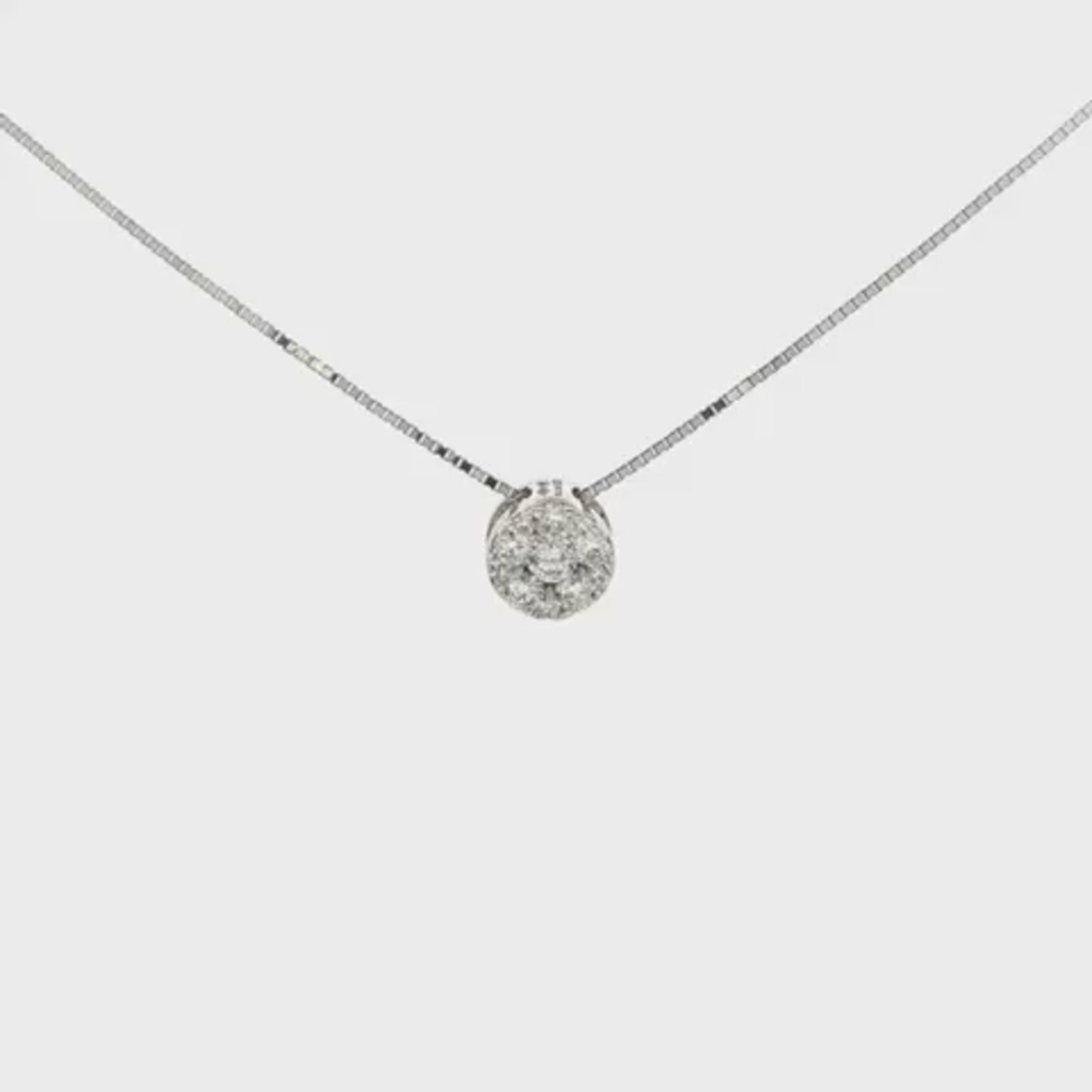 18K White gold diamond cluster pendant set with round brilliant diamonds. Item J37717 - ABC Jewelry Co. 