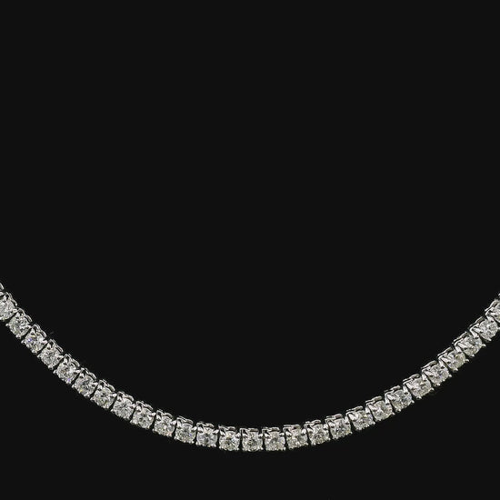 18K White gold tennis necklace set with round brilliant diamonds. Item J36278 - ABC Jewelry Co.