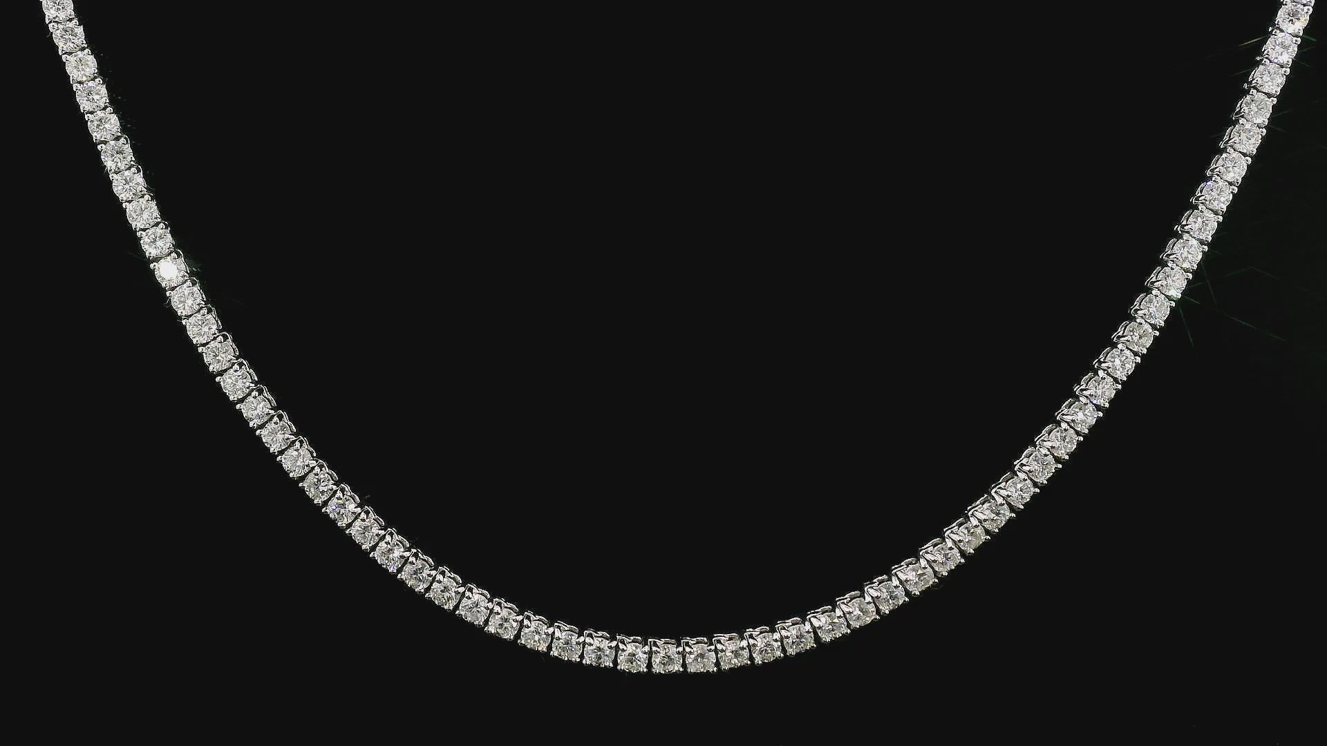 18K White gold tennis necklace set with round brilliant diamonds. Item J36278 - ABC Jewelry Co.