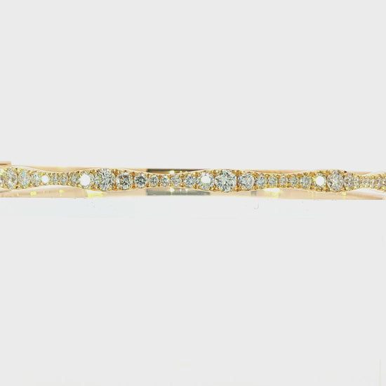 18K Yellow gold hinged bangle bracelet set with round brilliant diamonds. Item J38850 - ABC Jewelry Co. 