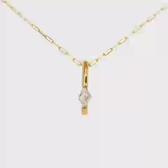 14K Yellow gold necklace with a paper clip chain and bar pendant set with a lozenge cut diamond. Item J37438 - ABC Jewelry Co. 