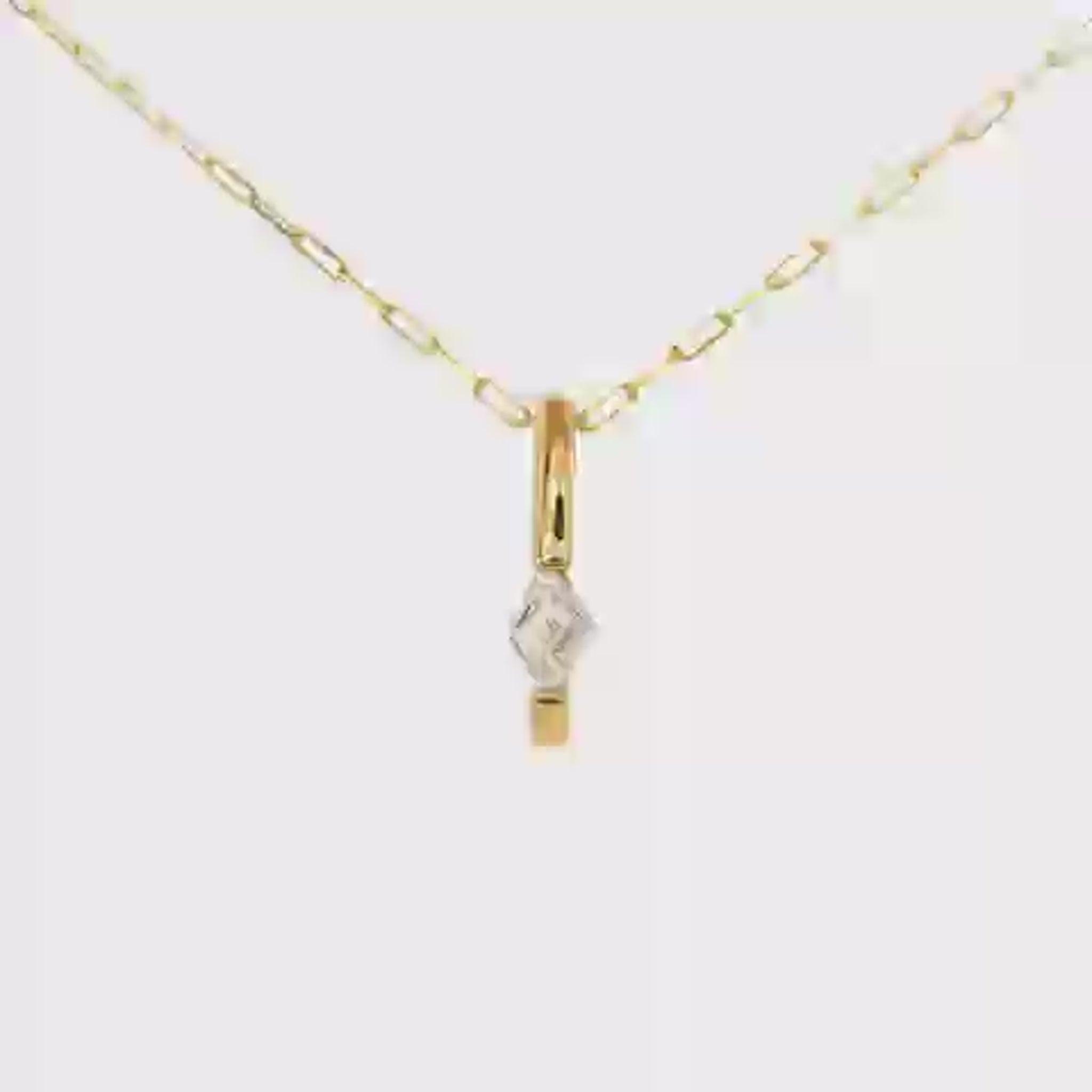 14K Yellow gold necklace with a paper clip chain and bar pendant set with a lozenge cut diamond. Item J37438 - ABC Jewelry Co. 