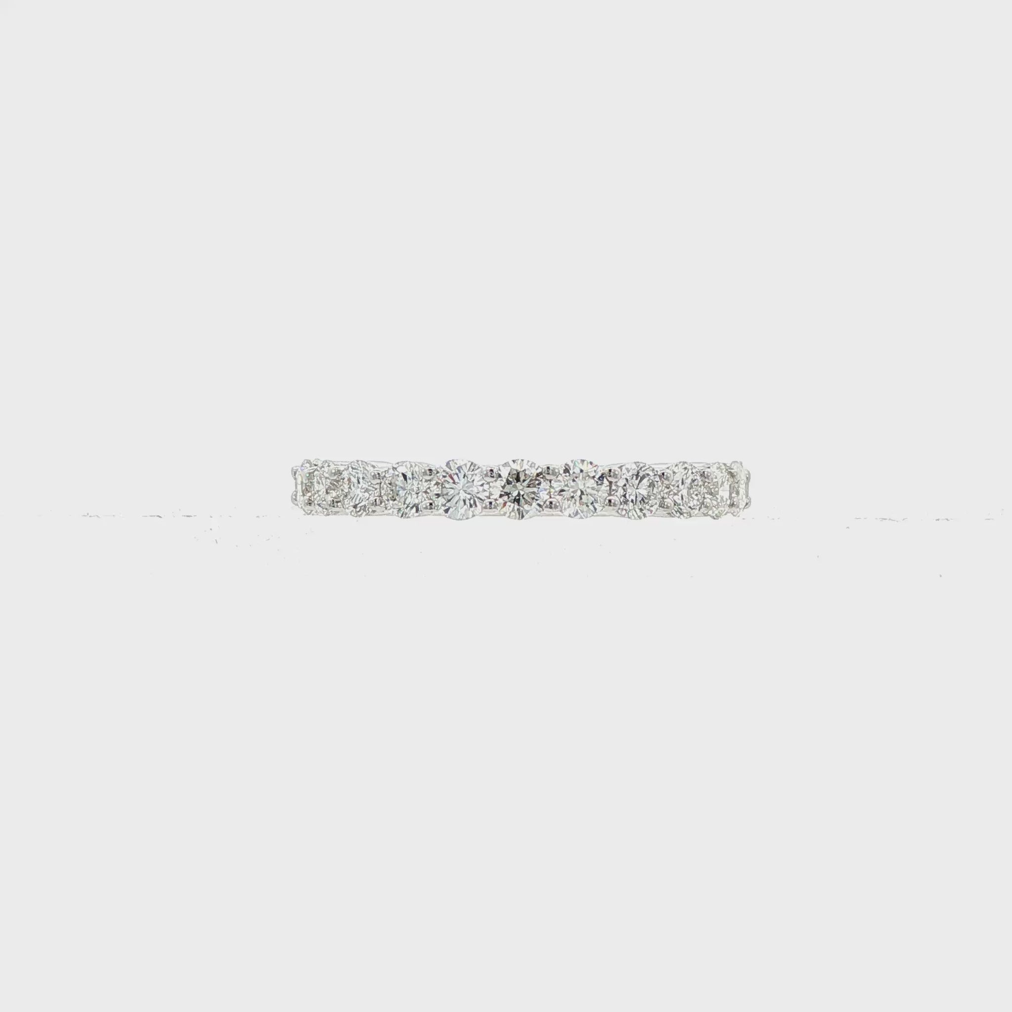 14K White gold band set with round brilliant diamonds. Item J35586 - ABC Jewelry Co. 