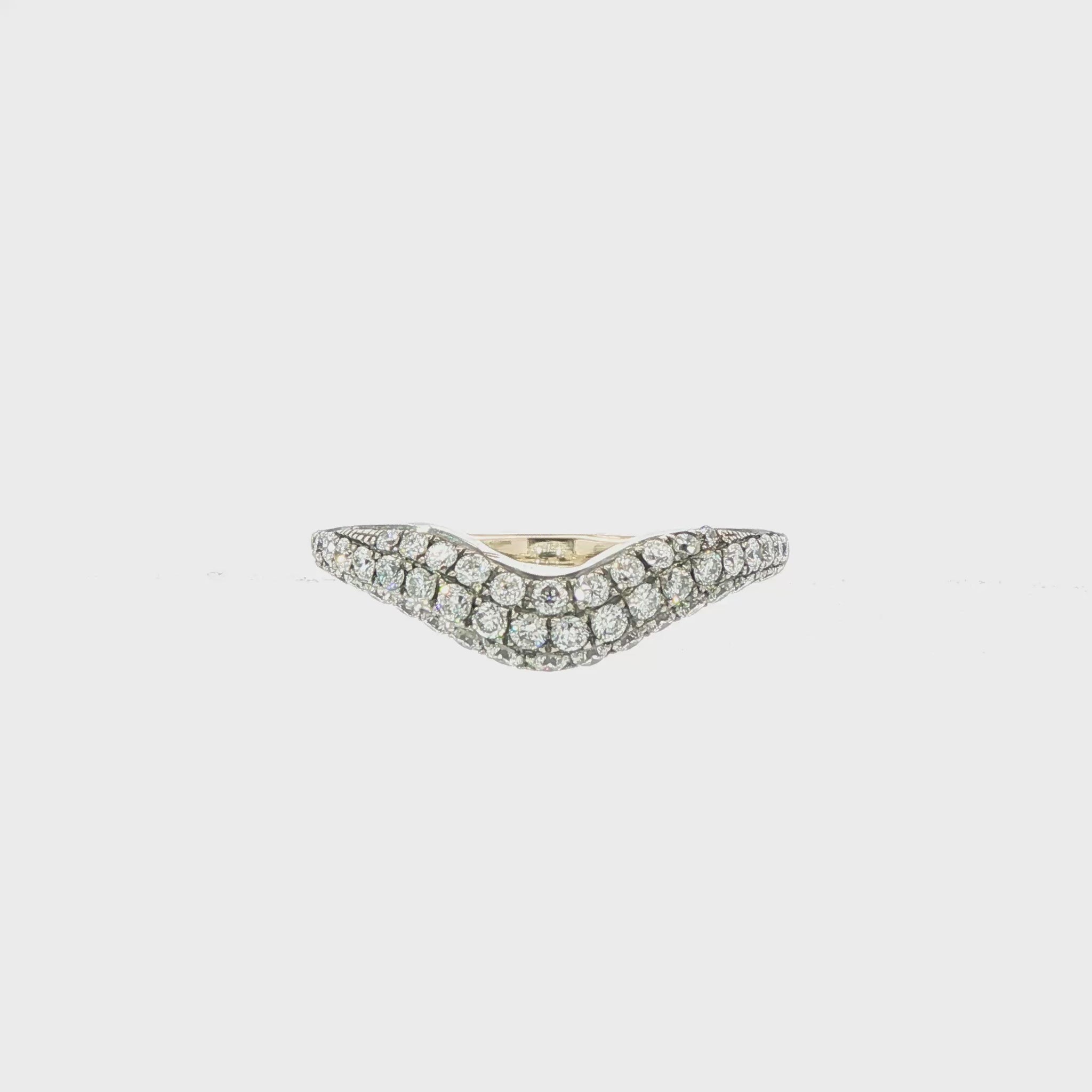 Curved band with 14K yellow gold shank and 18K white gold top pavé set with natural mined diamonds. Item J38913 - ABC Jewelry Co.