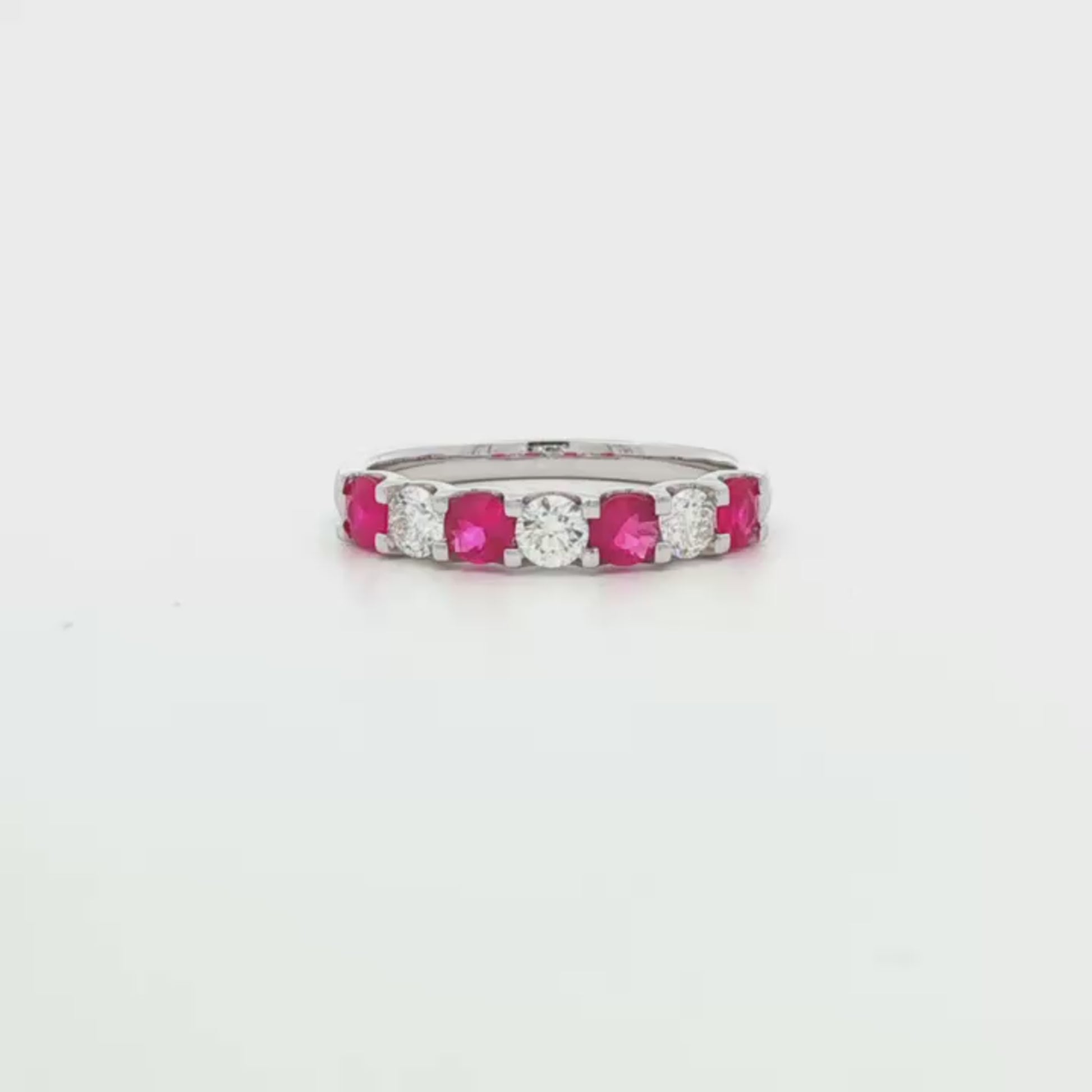 18K White gold band set with alternating diamonds and rubies. Item J37709 - ABC Jewelry Co. 