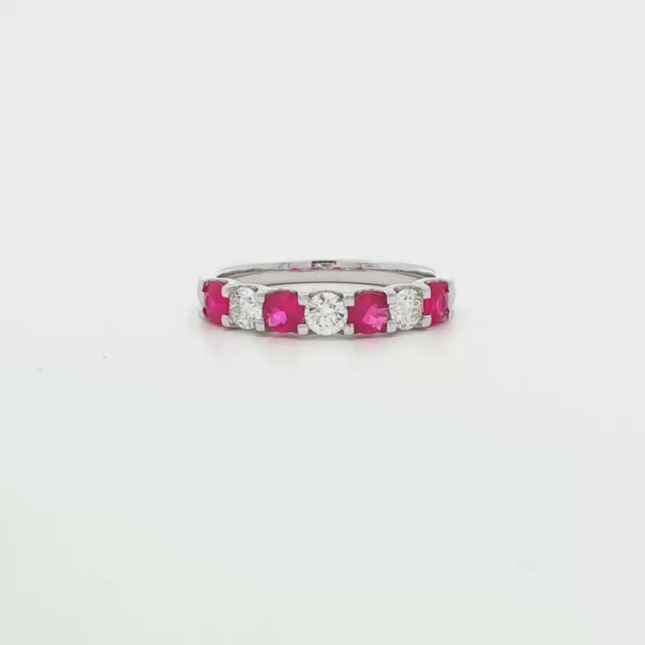 18K White gold band set with alternating diamonds and rubies. Item J37709 - ABC Jewelry Co. 