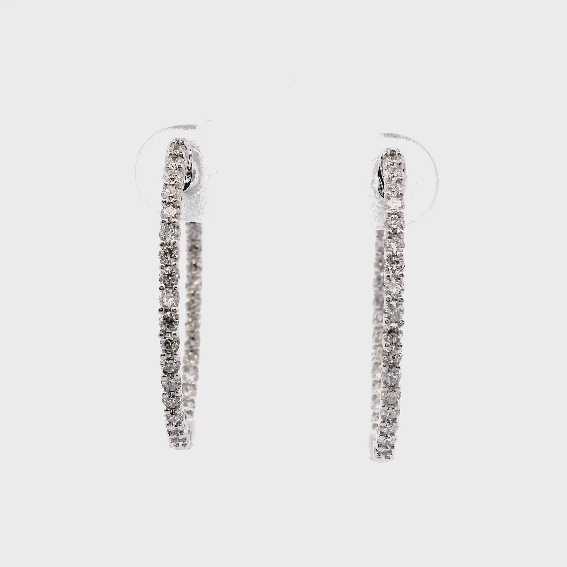 18K White gold delicate hoop earrings set with round brilliant diamonds - item J35792, ABC Jewelry Co