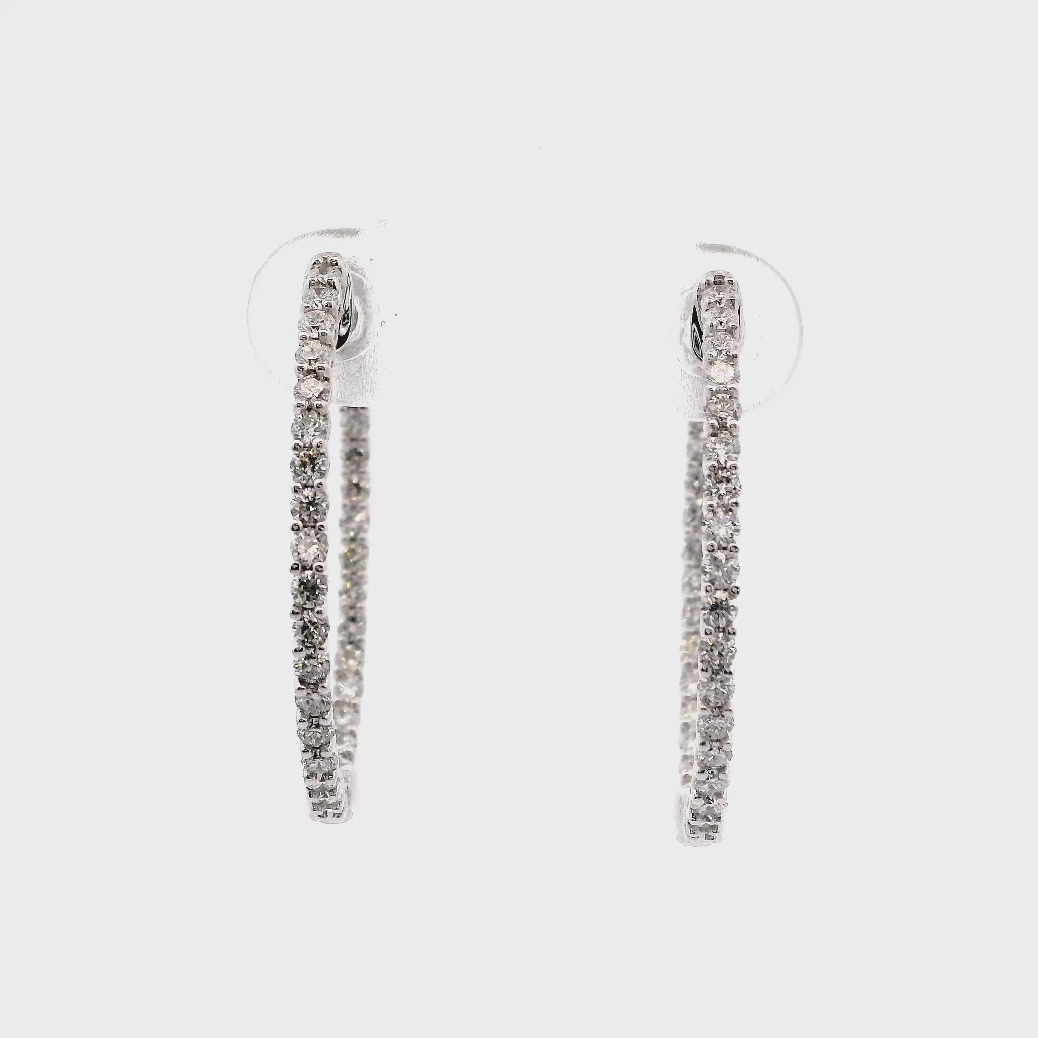 18K White gold delicate hoop earrings set with round brilliant diamonds - item J35792, ABC Jewelry Co