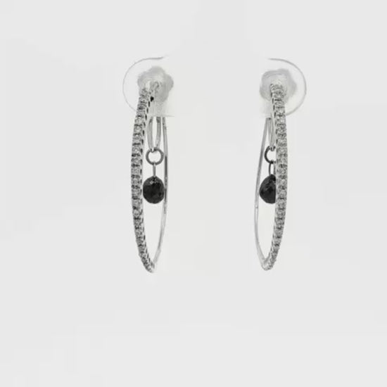 18K White gold diamond set hoop earrings with a black diamond briolette drop in the center of each. Item 19445 - ABC Jewelry Co. 