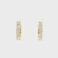 18K Yellow gold diamond set huggies. Item J38845 - ABC Jewelry Co.
