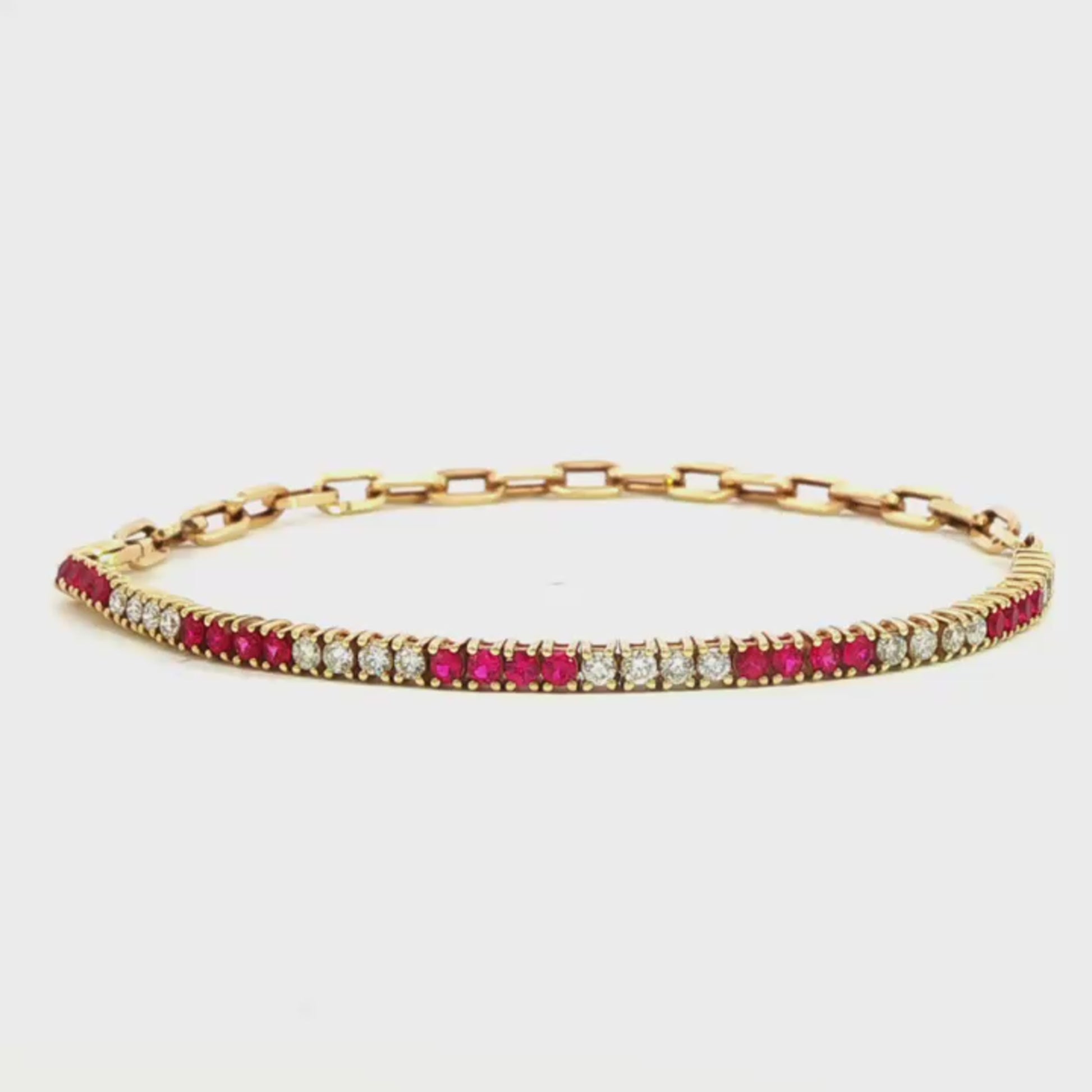 14K Yellow gold chain bracelet with alternating stacks of red rubies and diamonds. Item J35481 - ABC Jewelry Co. 
