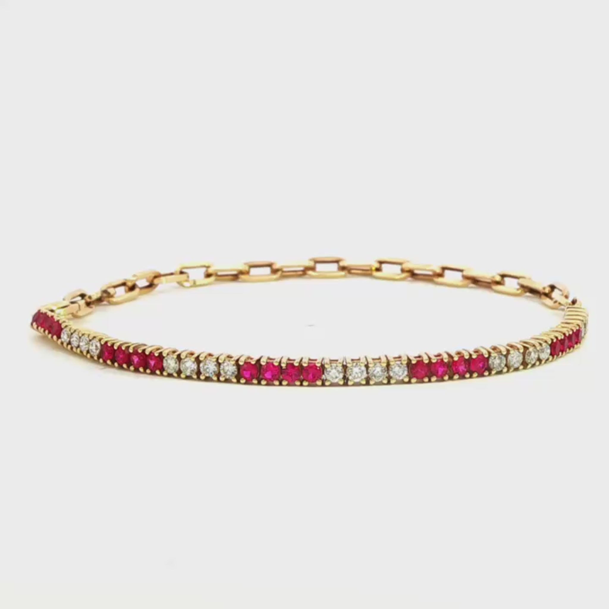 14K Yellow gold chain bracelet with alternating stacks of red rubies and diamonds. Item J35481 - ABC Jewelry Co. 