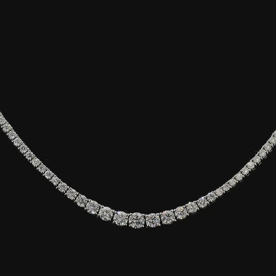 14K White Gold tennis necklace set with graduated round brilliant diamonds. Item J36990 - ABC Jewelry Co.