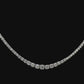 14K White Gold tennis necklace set with graduated round brilliant diamonds. Item J36990 - ABC Jewelry Co.