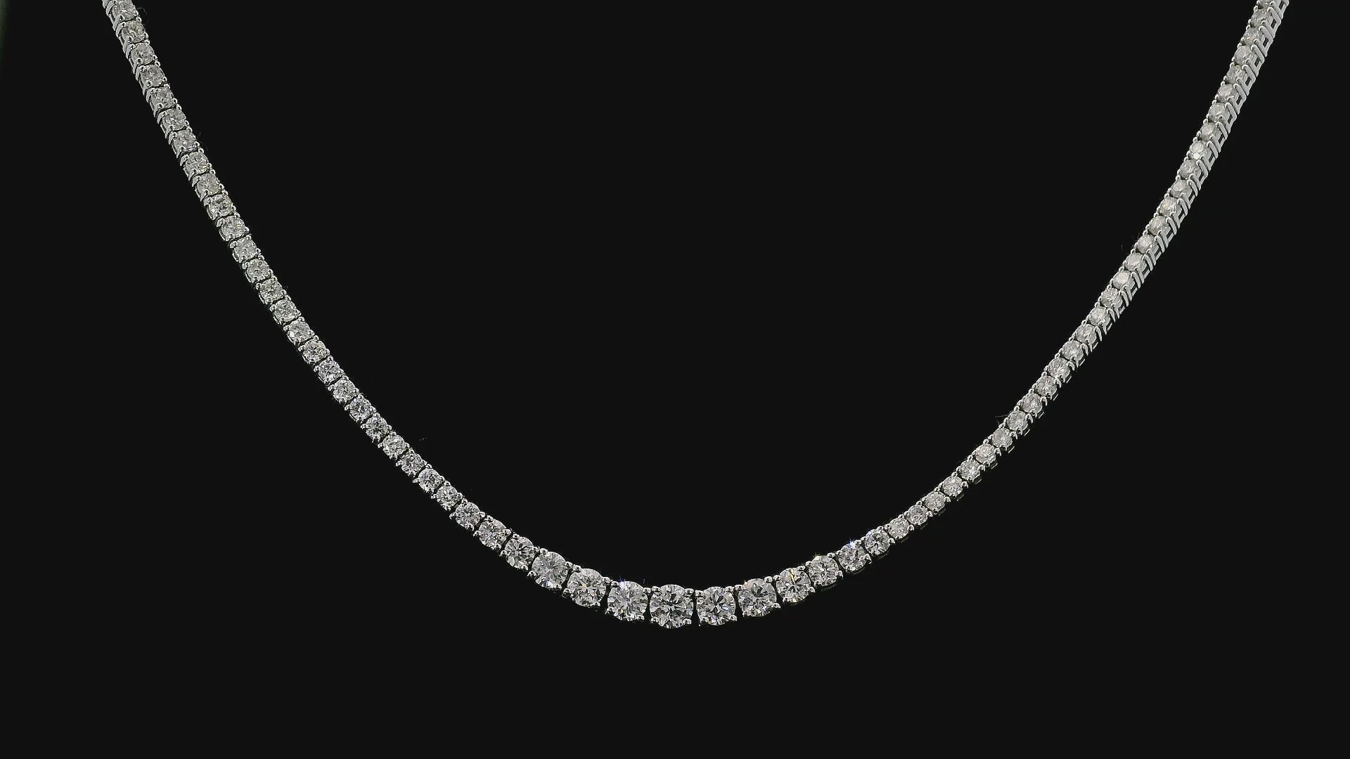 14K White Gold tennis necklace set with graduated round brilliant diamonds. Item J36990 - ABC Jewelry Co.