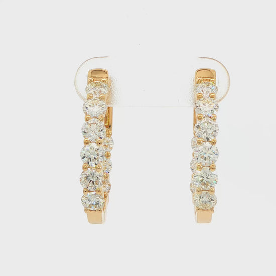 18K Yellow gold diamond hoop earrings. Item J38779 - ABC Jewelry Co. 