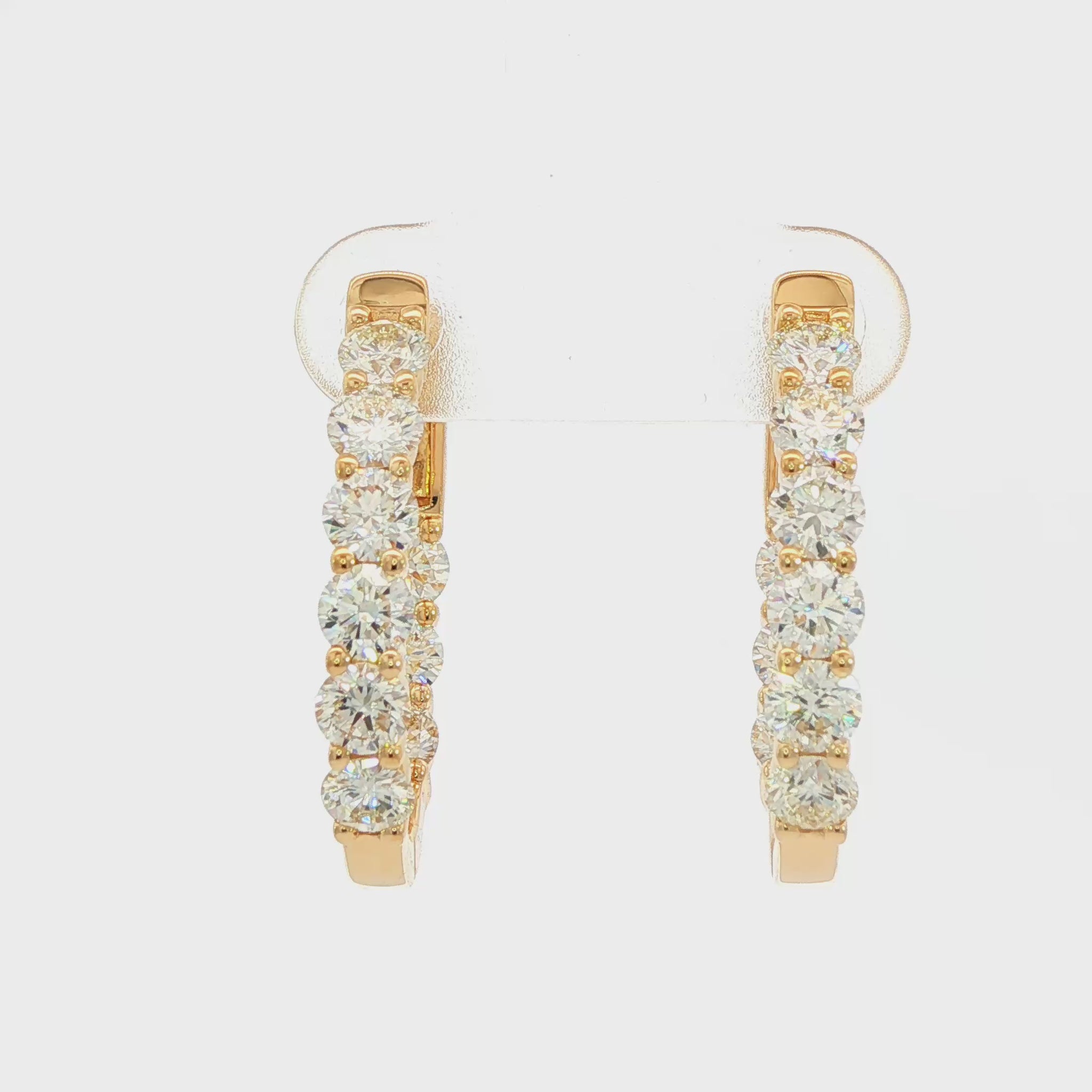 18K Yellow gold diamond hoop earrings. Item J38779 - ABC Jewelry Co. 