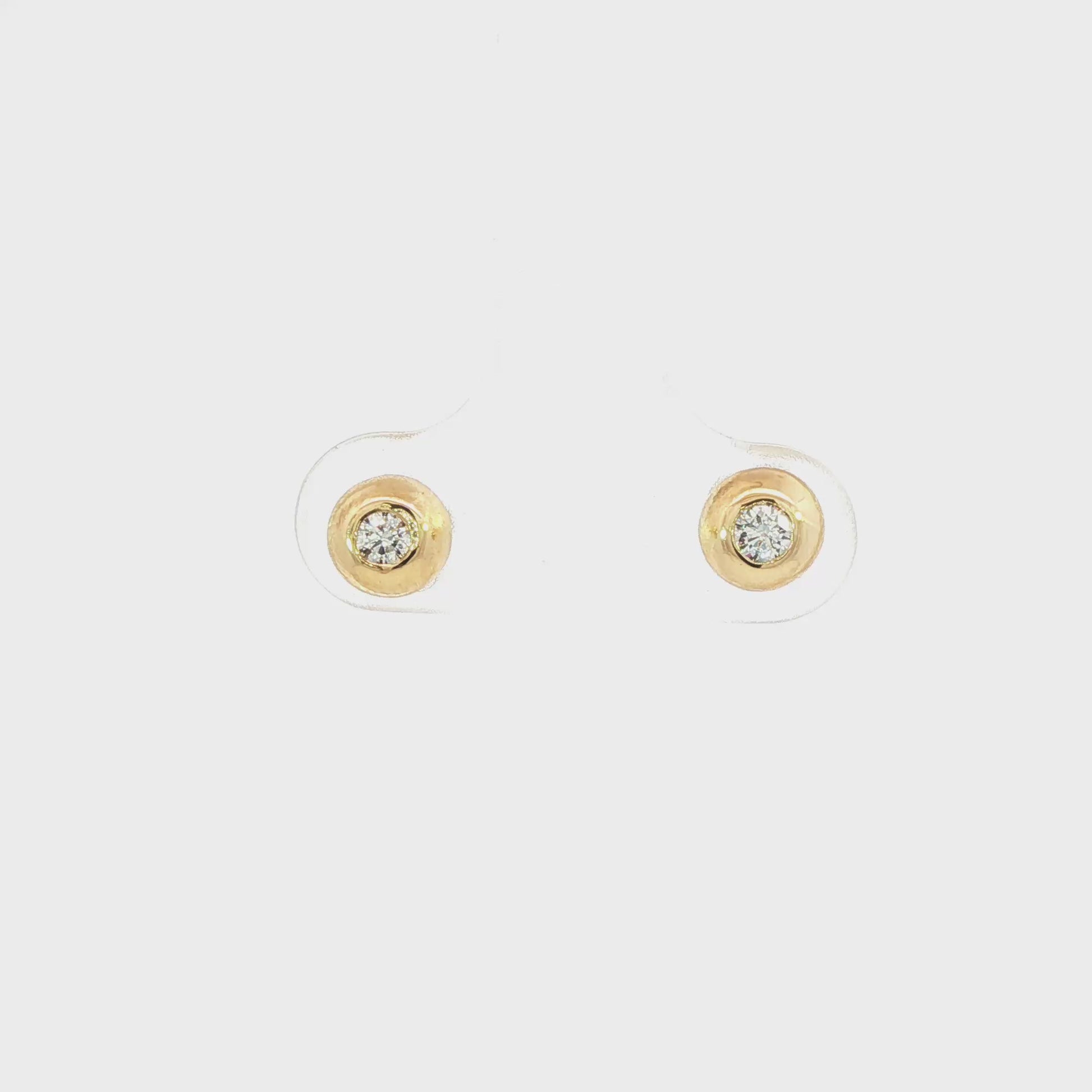 14K Yellow gold bezel set diamond stud earrings. Item J37666 - ABC Jewelry Co