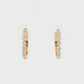 18K Yellow gold hoop earrings set with round brilliant diamonds. Item J38844 - ABC Jewelry Co.