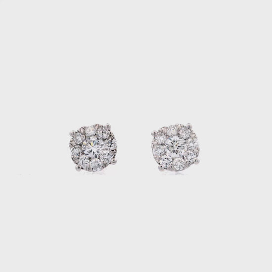 14K White gold diamond earrings with round brilliant centers surrounded by a halo of smaller round brilliant diamonds - item J37823, ABC Jewelry Co. 