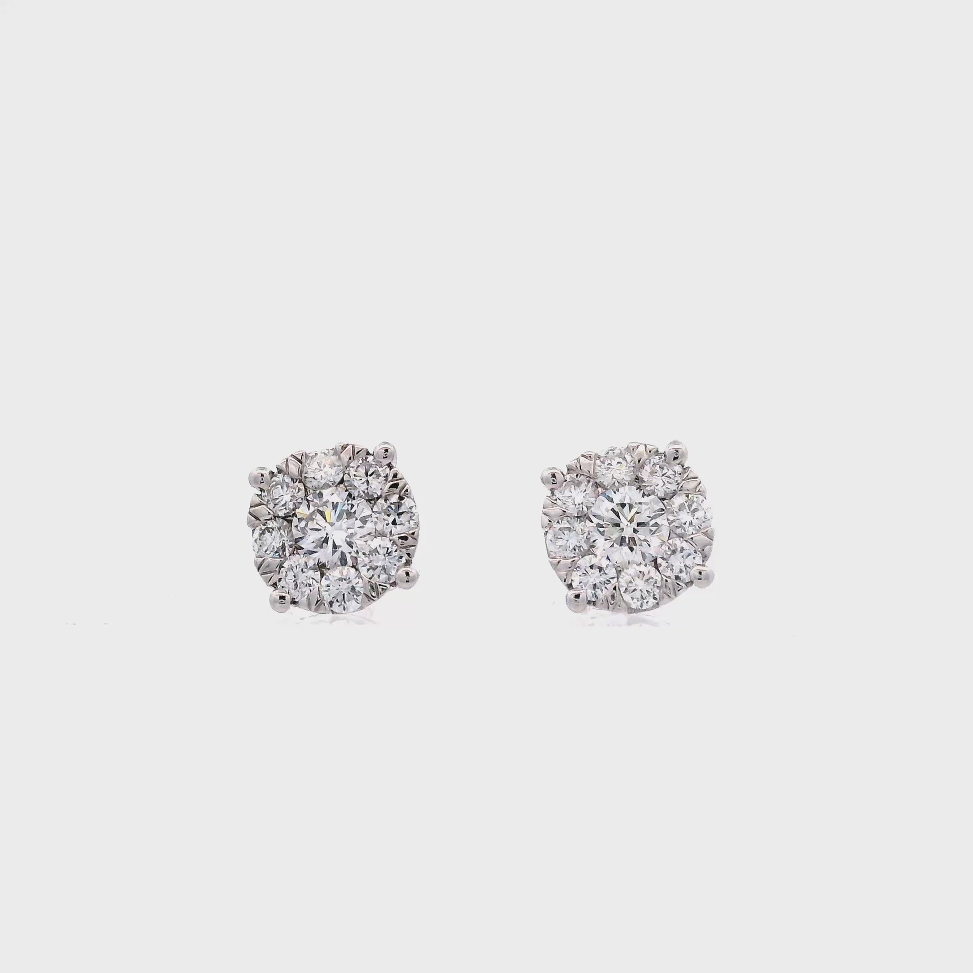 14K White gold diamond earrings with round brilliant centers surrounded by a halo of smaller round brilliant diamonds - item J37823, ABC Jewelry Co. 