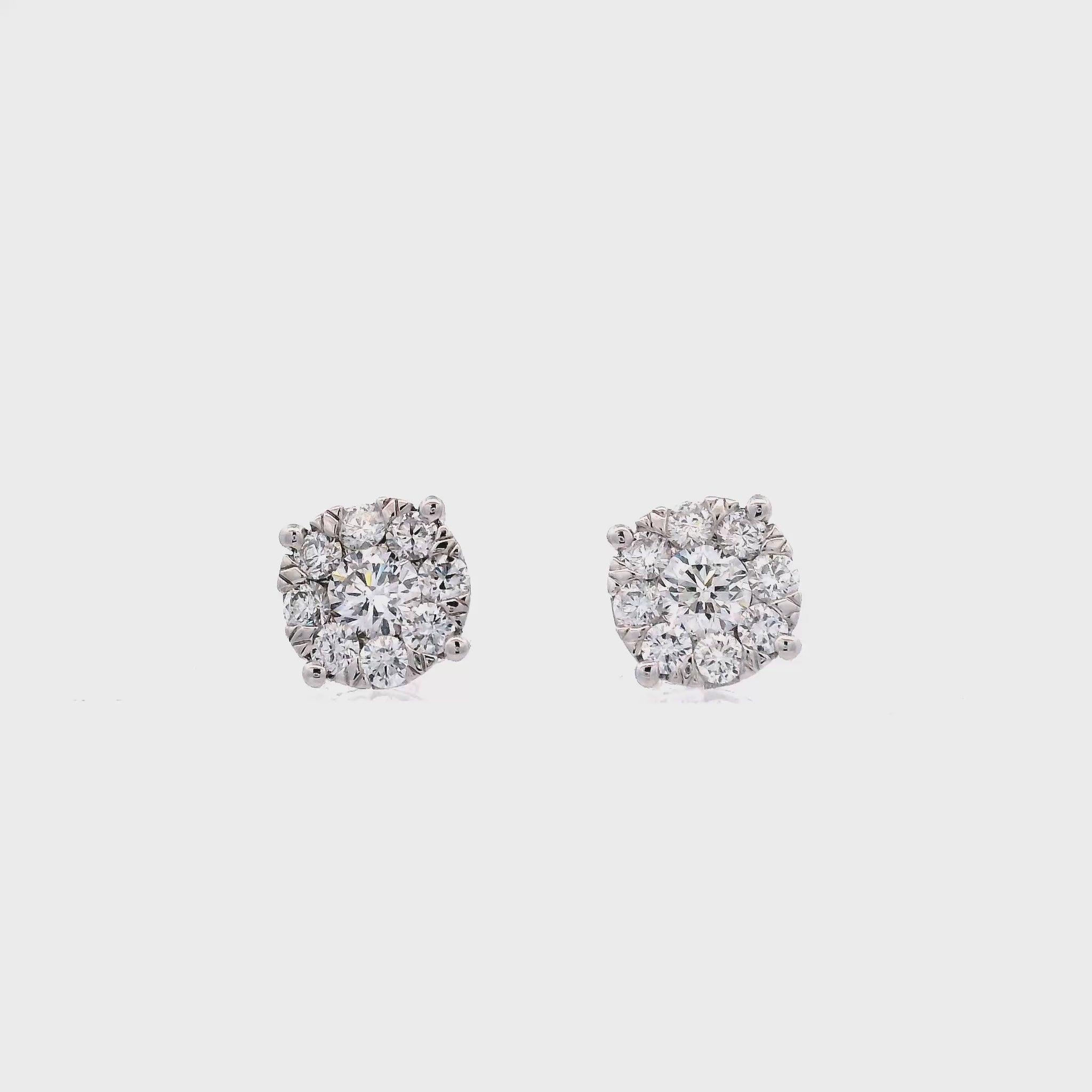 14K White gold diamond earrings with round brilliant centers surrounded by a halo of smaller round brilliant diamonds - item J37823, ABC Jewelry Co. 