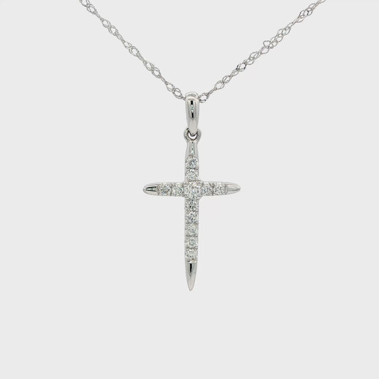 14K White gold cross necklace set with round brilliant diamonds. Item J38764 - ABC Jewelry Co. 