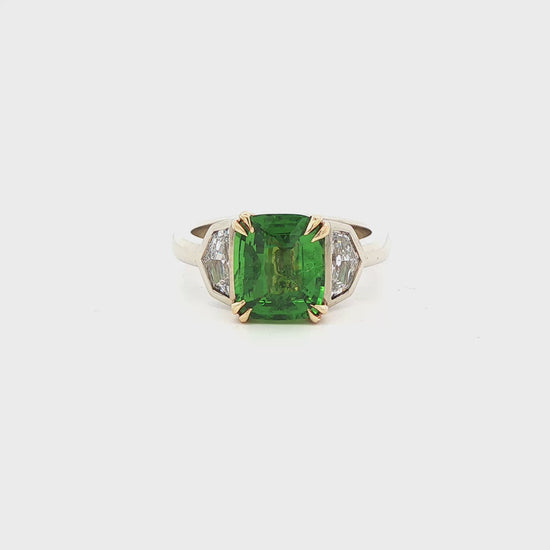 14K white & yellow gold ring set with a green tsavorite center stone and two Cadillac cut diamonds. Item #J36895 - ABC Jewelry Co.
