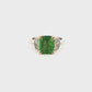 14K white & yellow gold ring set with a green tsavorite center stone and two Cadillac cut diamonds. Item #J36895 - ABC Jewelry Co.